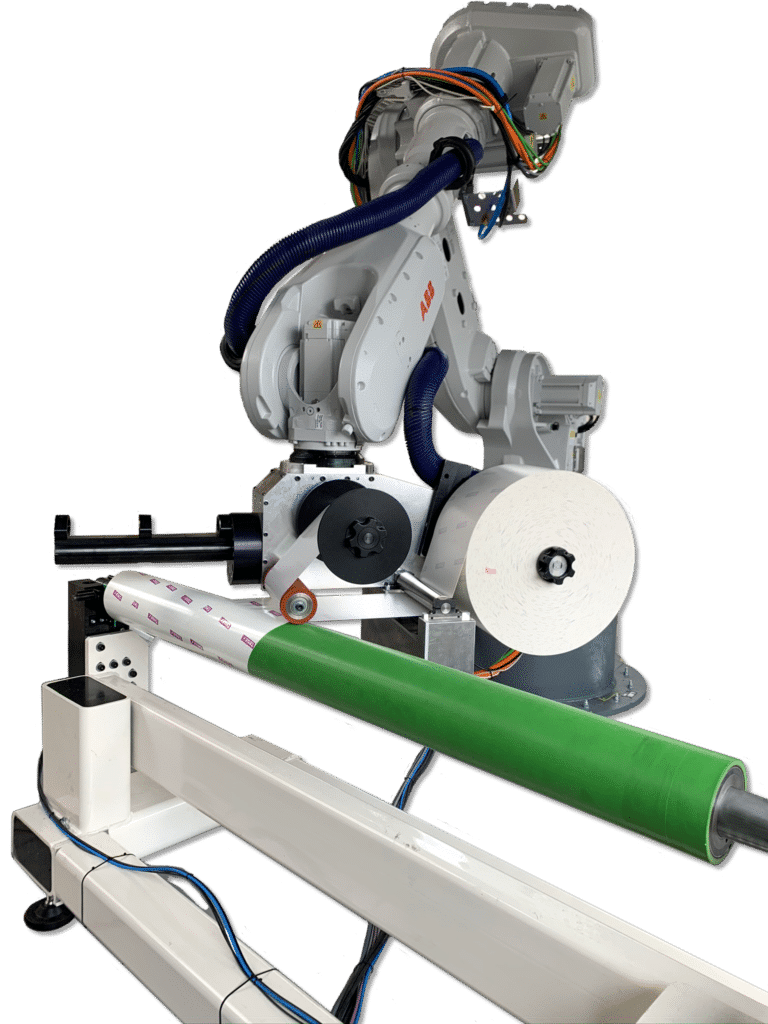 Robot mounting of plate mounting tape eliminates manual taping, other tape errors causing time waste.