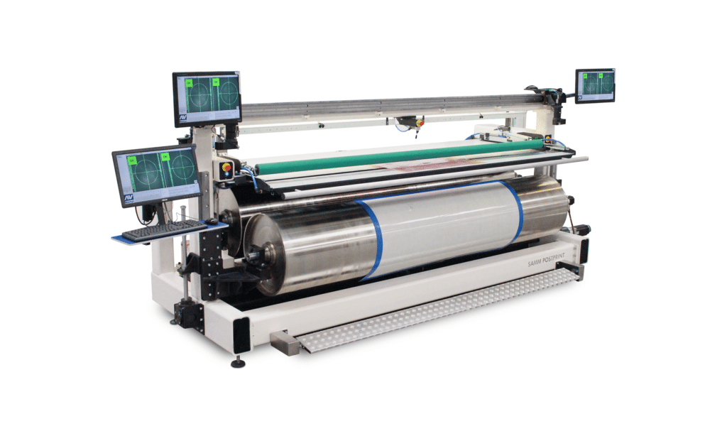 Automatic corrugated flexo plate mounting machine mounts and proofs plates on mylars with precision.